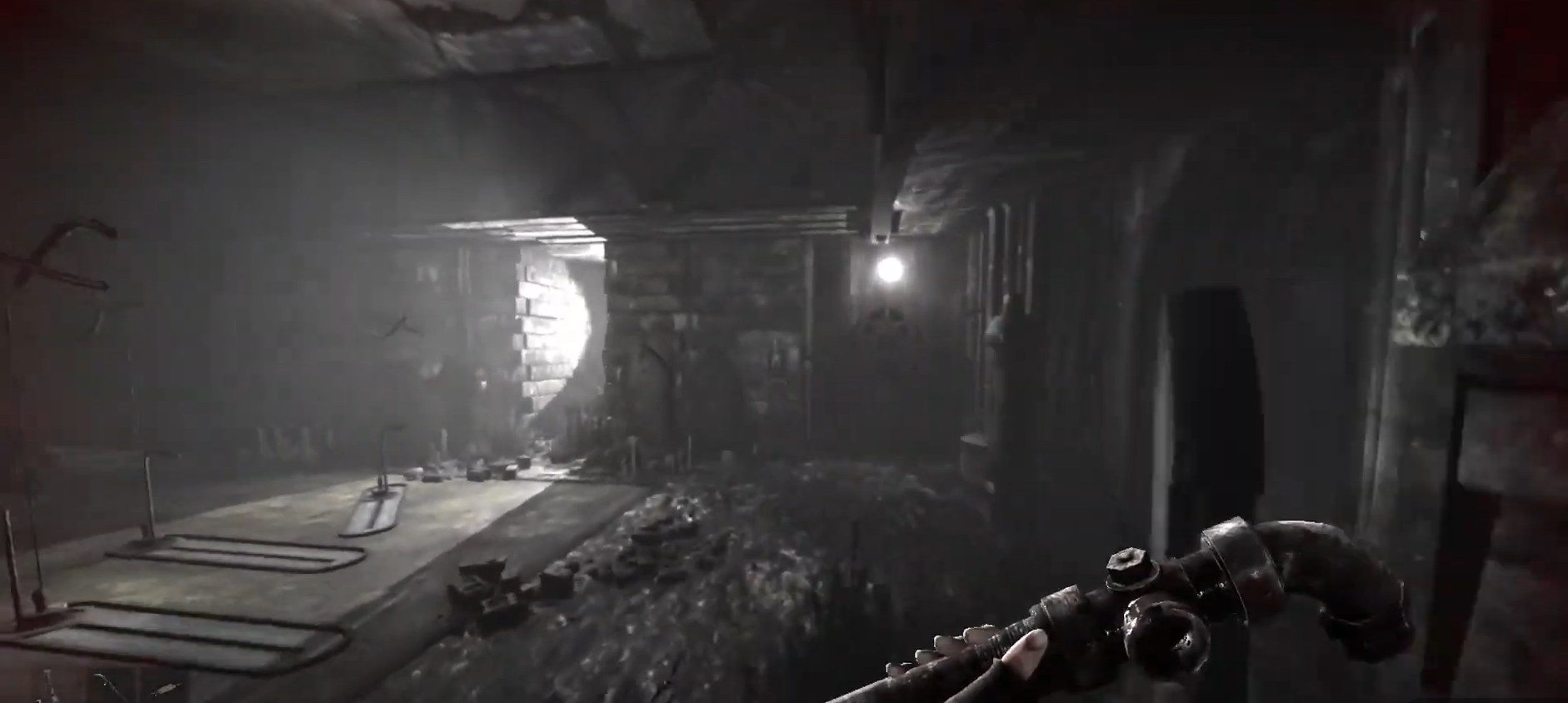 The hangar control room where the spare fuse is located, showing the desk and elevator entrance